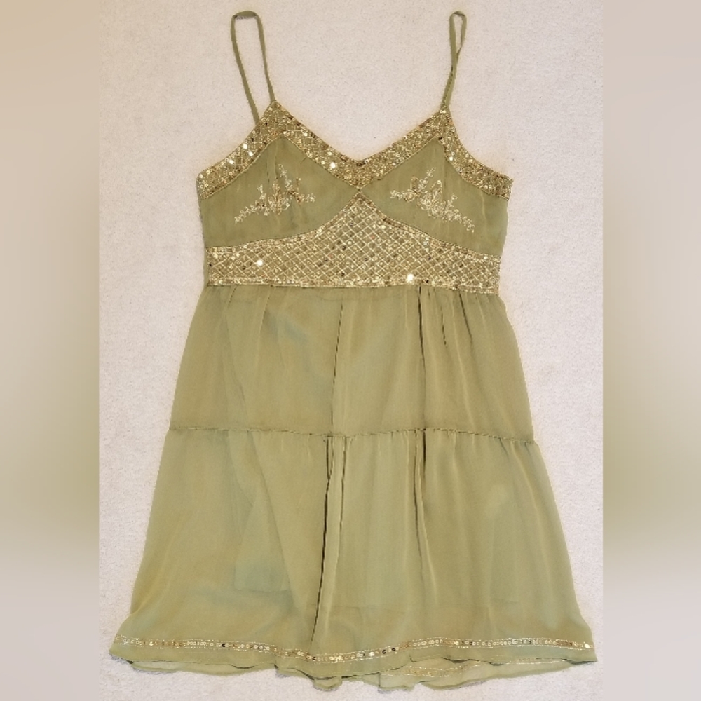 Green top with gold sequins, size M